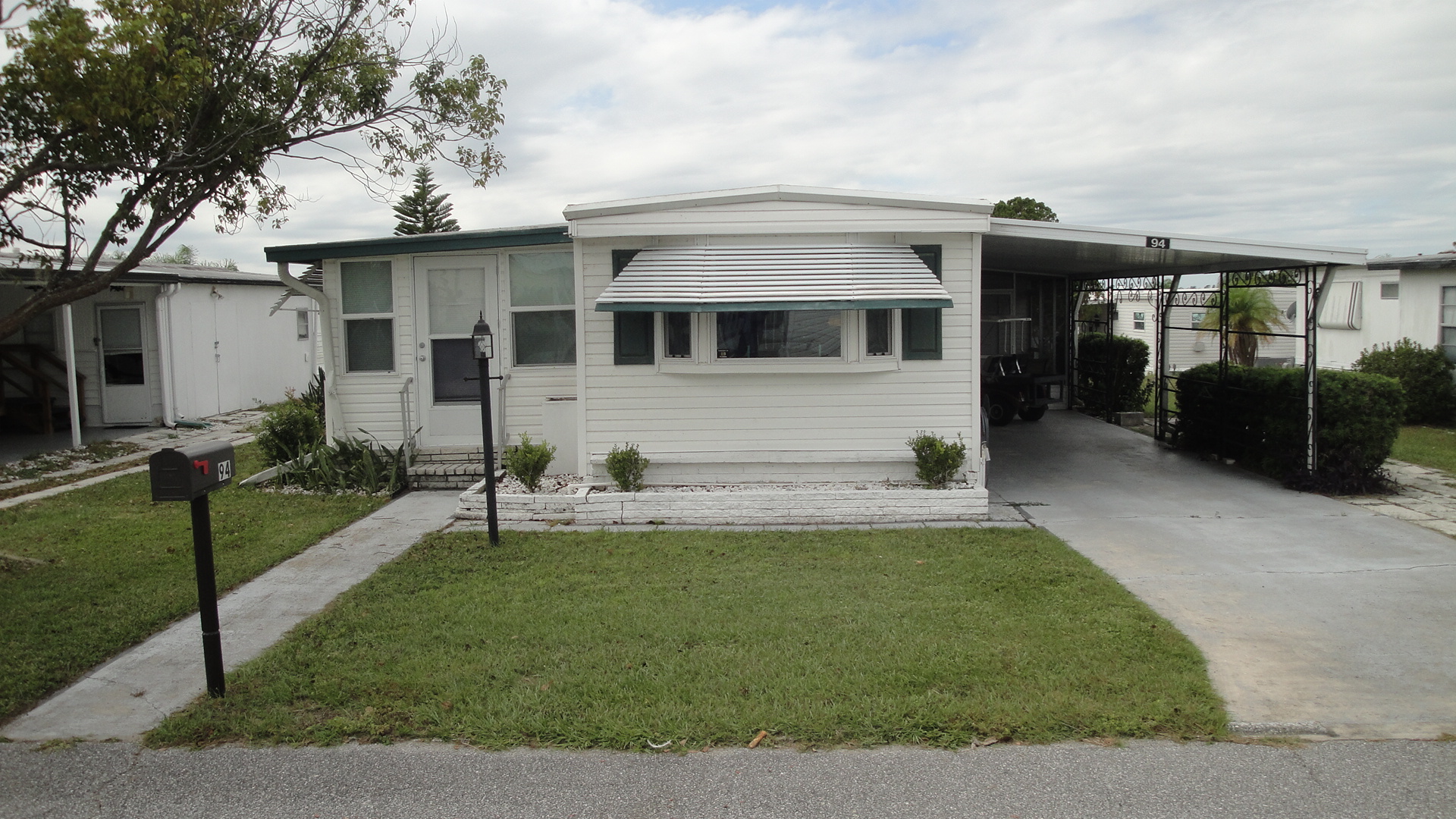 2 94 Front of House Lake Region Village